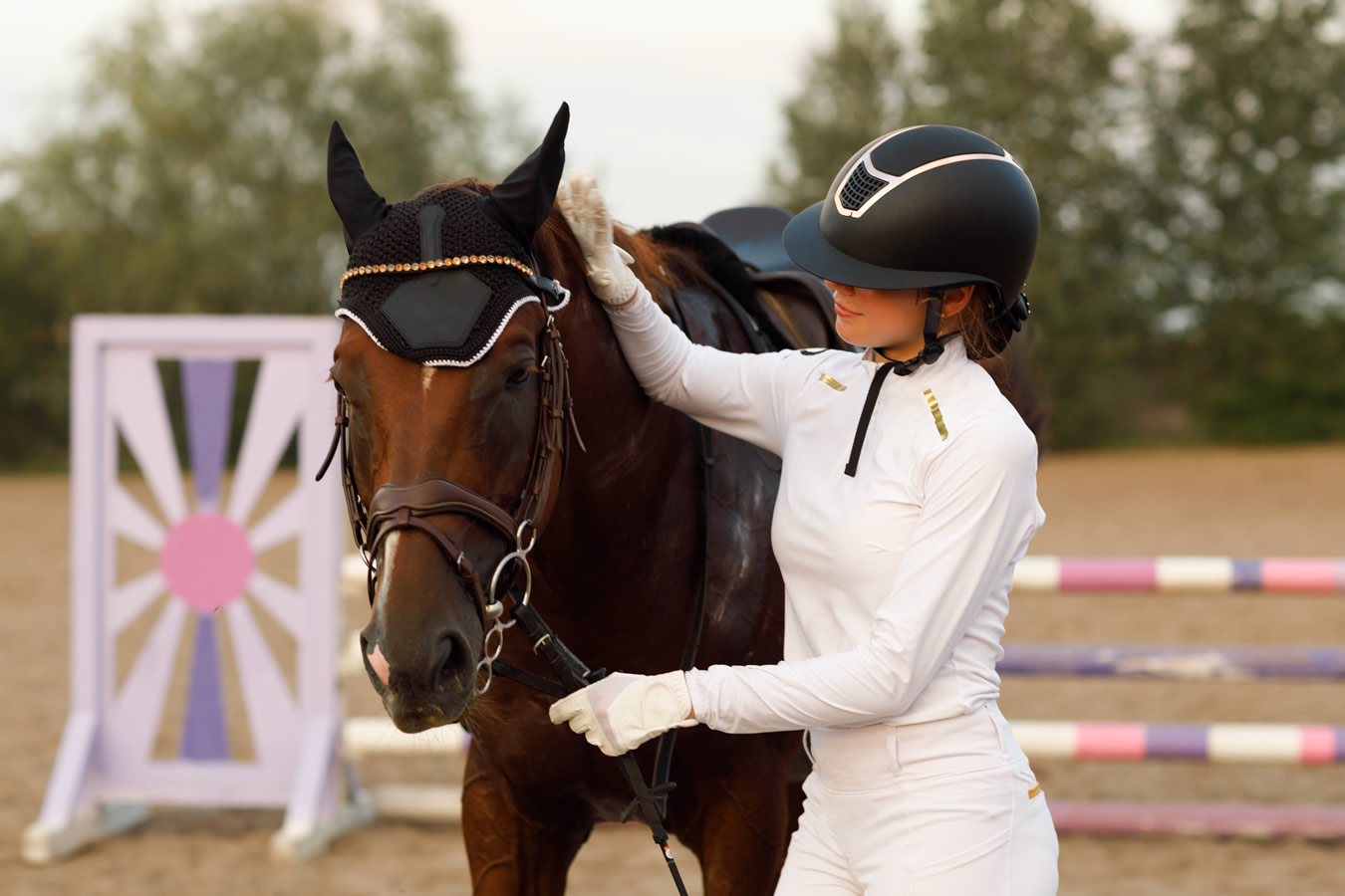 dressage-horse-with-ear-covers-jockey-rider-uniform-portrait-equestrian-jumping